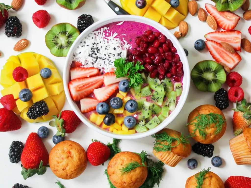 Colorful smoothie bowl with fresh fruits like kiwi, berries, and mango