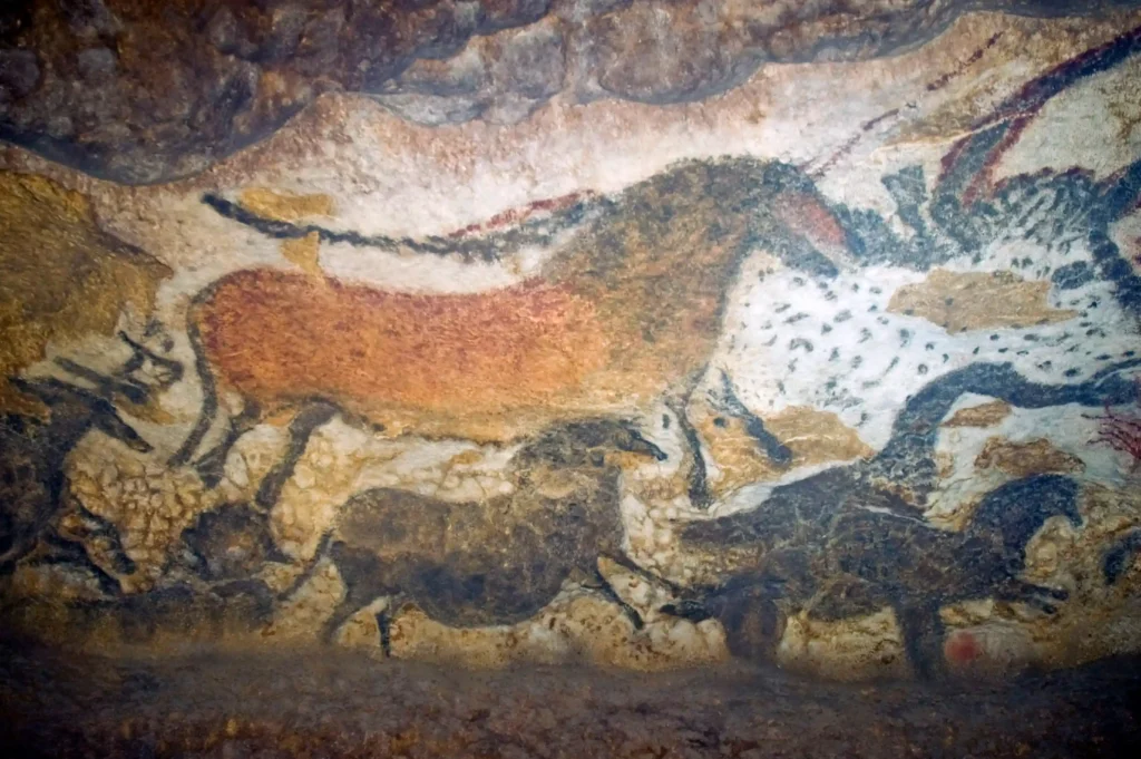Showing reproductions of prehistoric cave paintings in Lascaux II
