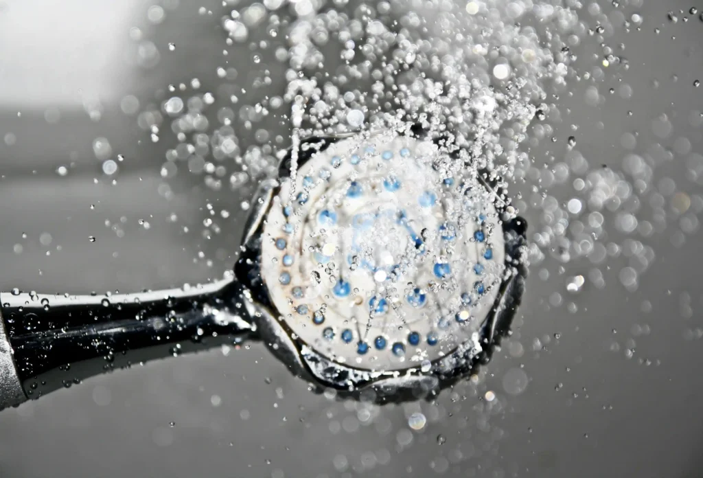 cold water exposure from a shower head for wellness routine