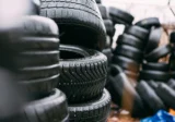 why are tires black pile of black car tires in storage